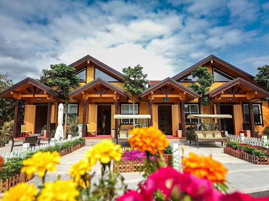 Floral-Embracing Small Wooden House Blooms as Ultimate Nature Retreat