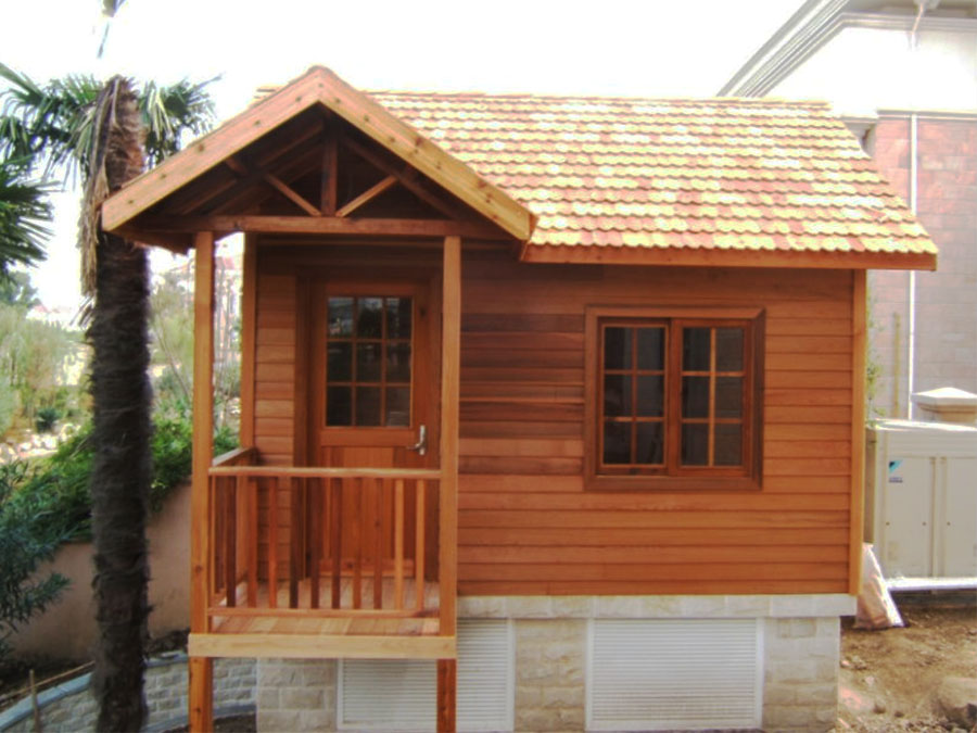 Charming Small Wooden House Offers Vibrant Countryside Escape