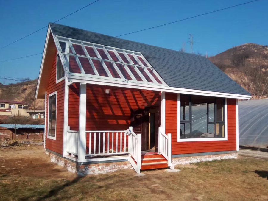Mahogany-Toned Small Wooden House Offers Perfect Nature Escape