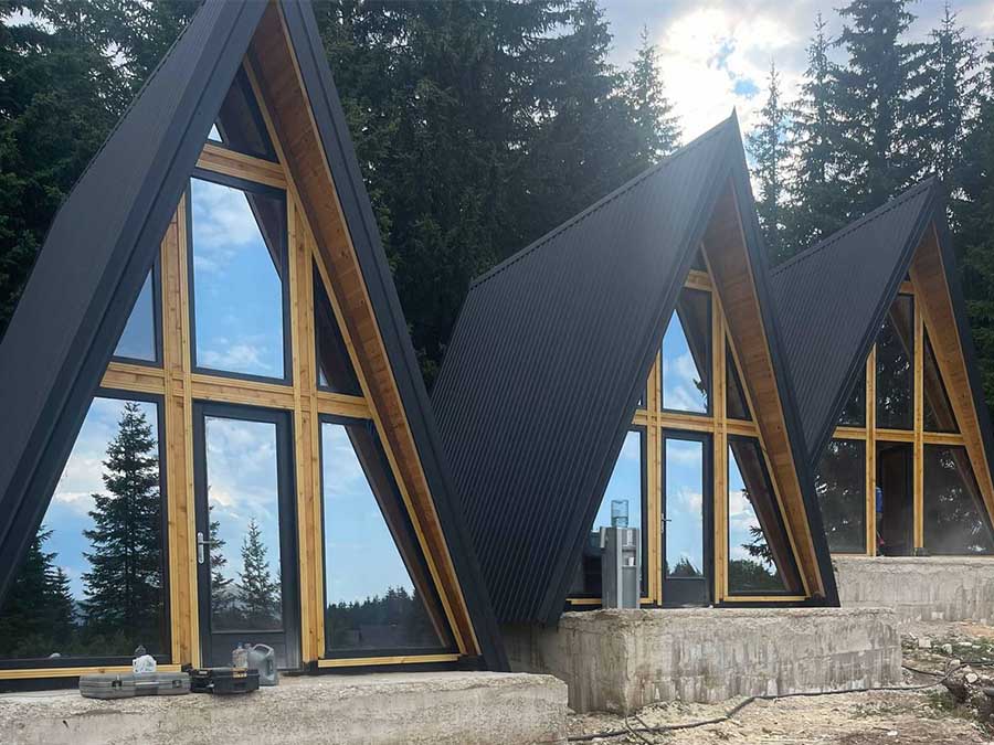 Triangular Small Wooden Houses Offer Unique Accommodation and Scenic Views